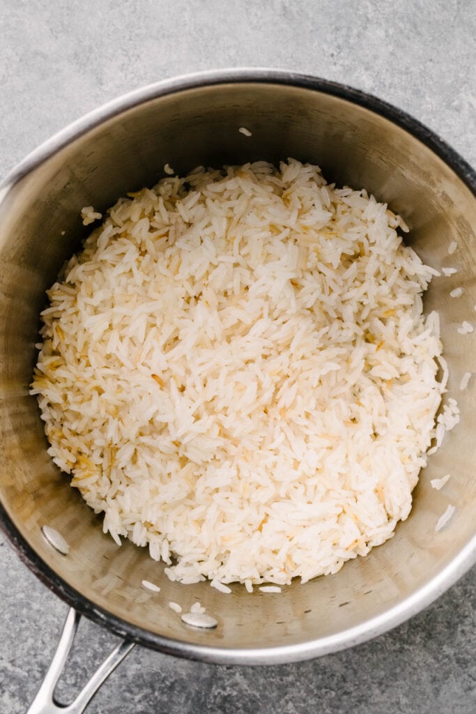 Steamed white rice in a saucepan.