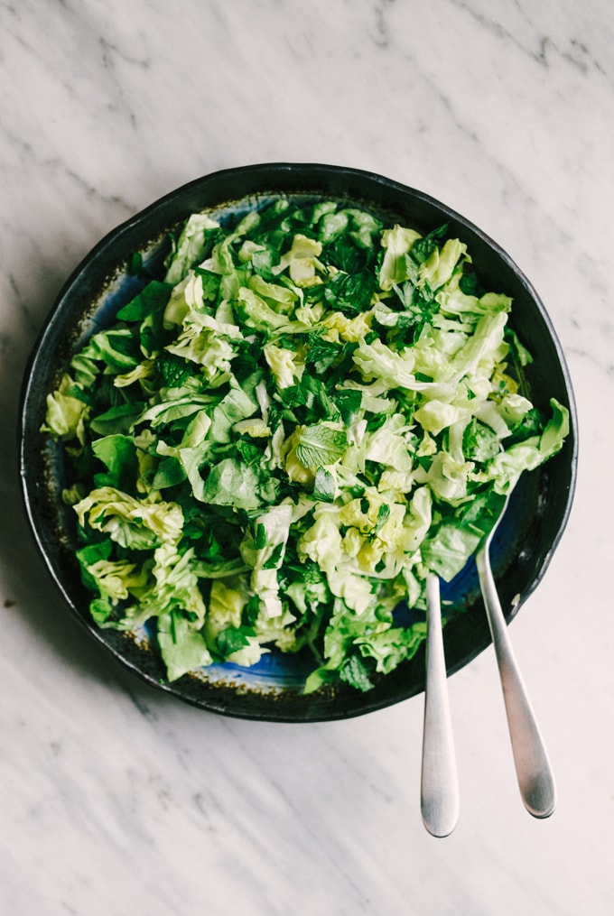 This recipe for chicken shawarma salad is a flavorful, fresh, easy weeknight dinner. Each bite is crisp, bright, and bursting with flavor. This is the perfect whole food summer weeknight dinner recipe! #healthy #wholefood #realfood #eatclean