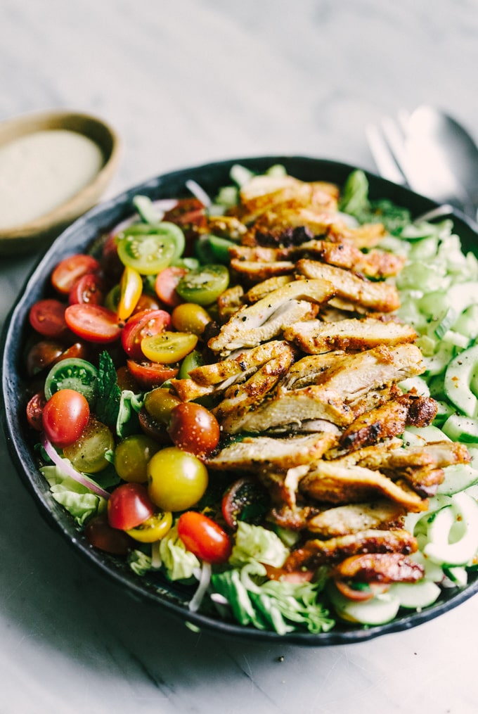 This recipe for chicken shawarma salad is a flavorful, fresh, easy weeknight dinner. Each bite is crisp, bright, and bursting with flavor. This is the perfect whole food summer weeknight dinner recipe! #healthy #wholefood #realfood #eatclean