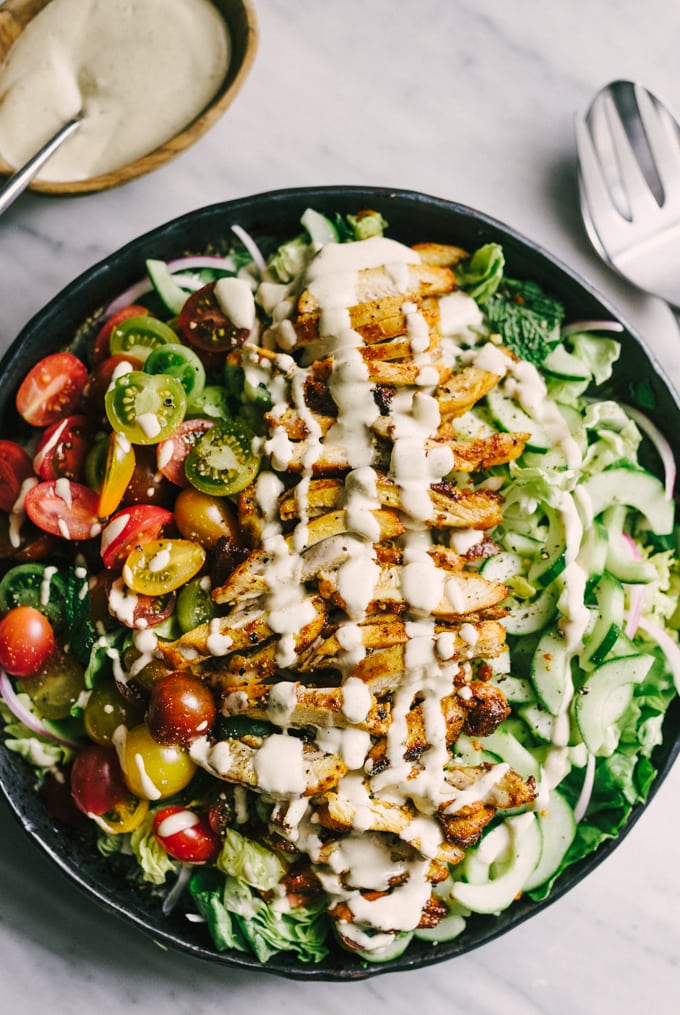 This recipe for chicken shawarma salad is a flavorful, fresh, easy weeknight dinner. Each bite is crisp, bright, and bursting with flavor. This is the perfect whole food summer weeknight dinner recipe! #healthy #wholefood #realfood #eatclean