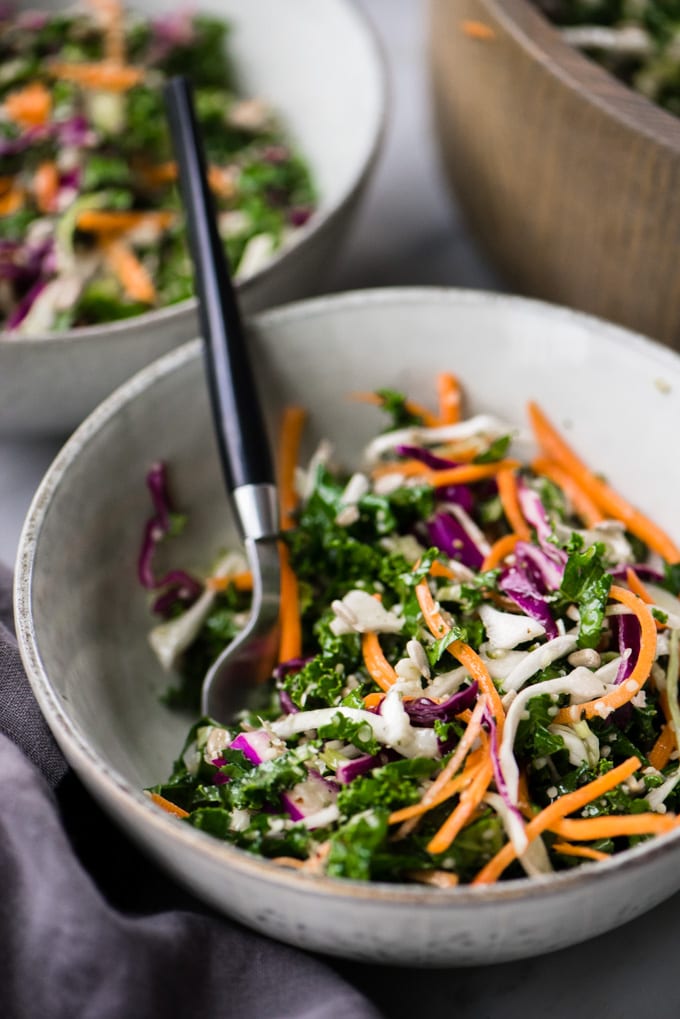 Crunchy kale slaw in a bowl served as a side salad.