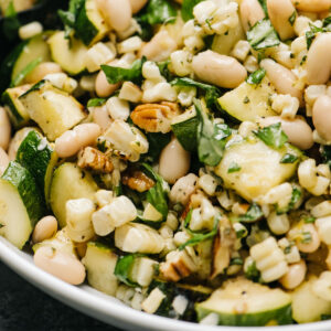 Grilled zucchini salad in a bowl.