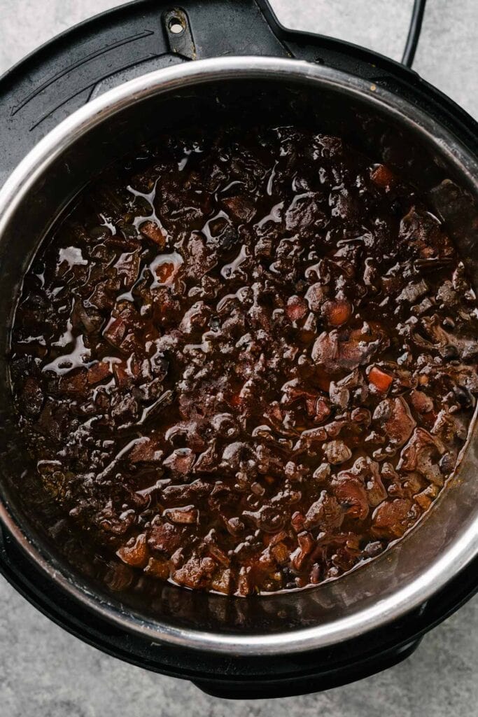 Black bean soup in an Instant Pot after pressure cooking, but before being pureed.