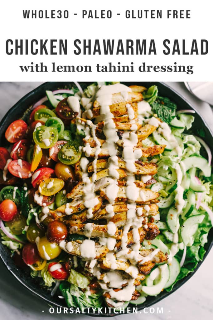 A platter of chicken shawarma salad with tomatoes, cucumbers, butter lettuce, fresh mint and parsley, and drizzled with lemon tahini dressing.