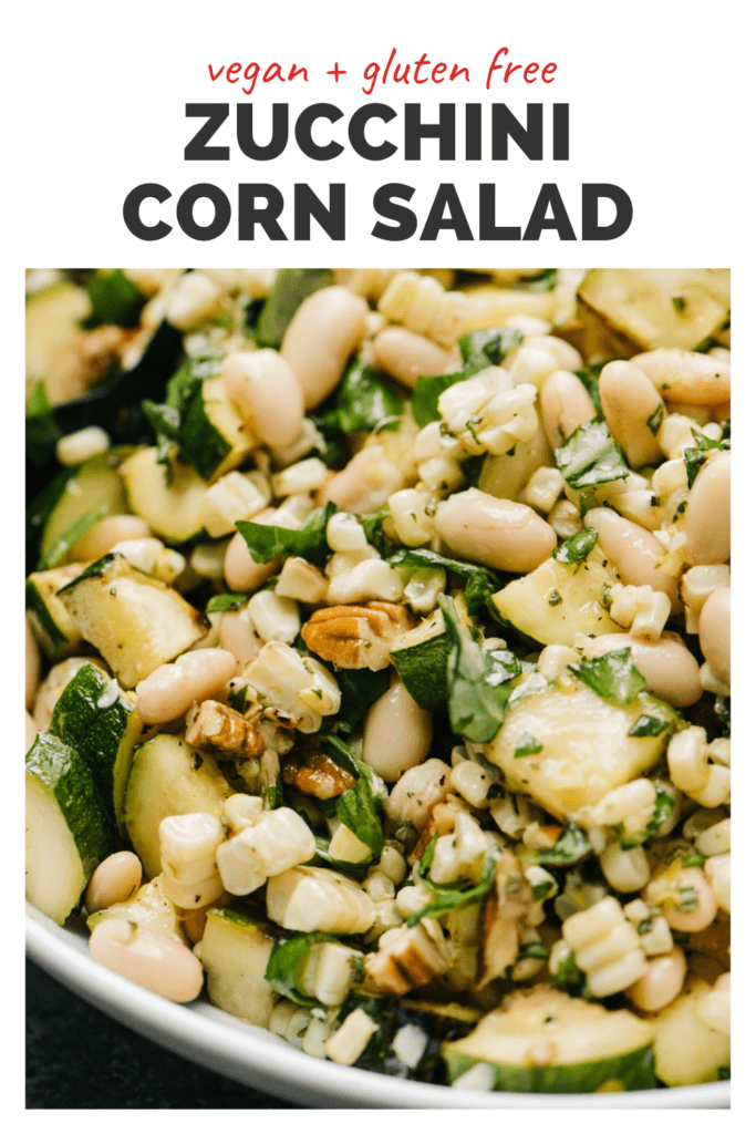 Grilled zucchini corn salad in a bowl with a top white banner that reads vegan and gluten free zucchini corn salad.